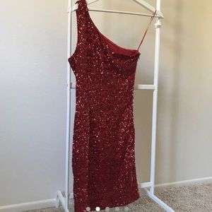 Cute little red dress covered in sequins!